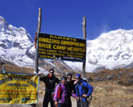 Group-Photo-before-the-Annapurna-Base-Camp-with-Sign-Board